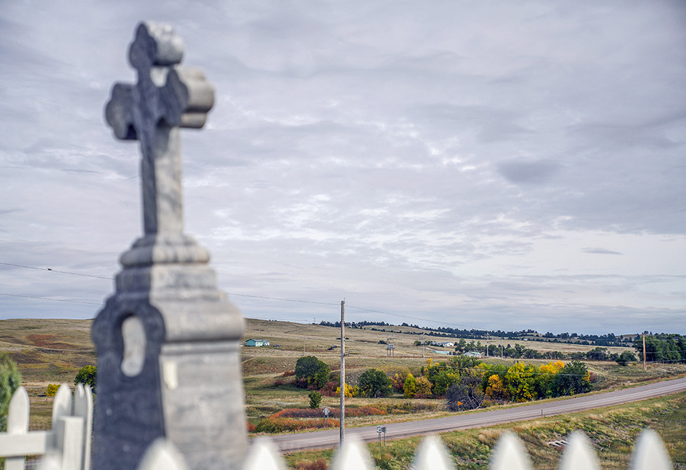 Pine Ridge Indian Reservation is seen from the burial place of 19th-century Chief Red Cloud Sept. 30, 2021 in Pine Ridge, South Dakota. Red Cloud defended against U.S. land grabs as long as he could but converted to Catholicism and invited the Jesuits to start Holy Rosary Mission after he and his people were confined to Pine Ridge. (AP/Emily Leshner)