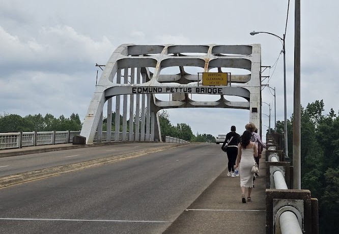 Graduate students in theology and ministry at Catholic Theological Union walk across the Edmund Pettus Bridge in Selma, Alabama, during a pilgrimage of sacred sites from the U.S. Civil Rights Movement. 