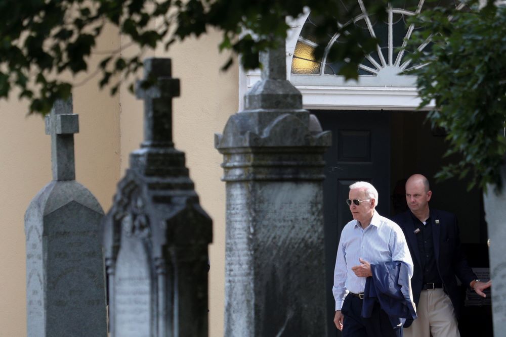 Biden leaves church.