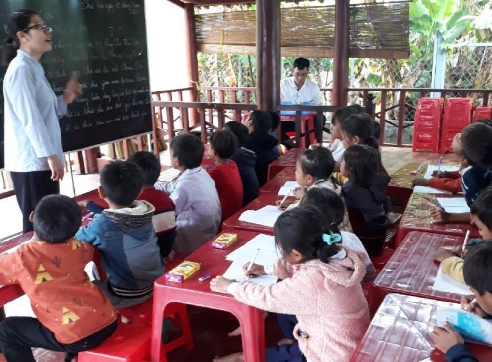 Sister teaches a first-grade class.