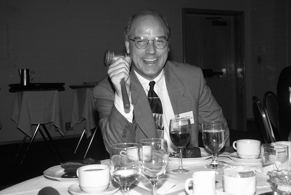 Tony Spence holds a gavel as president of the Catholic Press Association during a convention. (Courtesy of Tennessee Register)