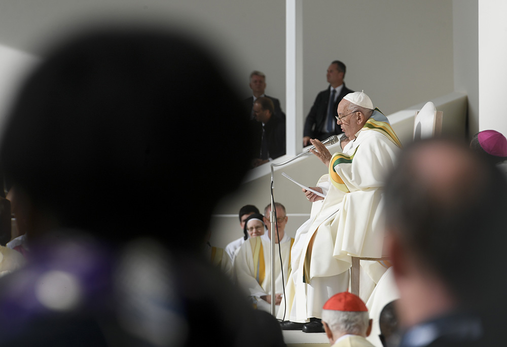 Pope Francis gives his homily during Mass in Brussels' open-air King Baudouin Stadium Sept. 29, his last day in Belgium. (CNS/Vatican Media)