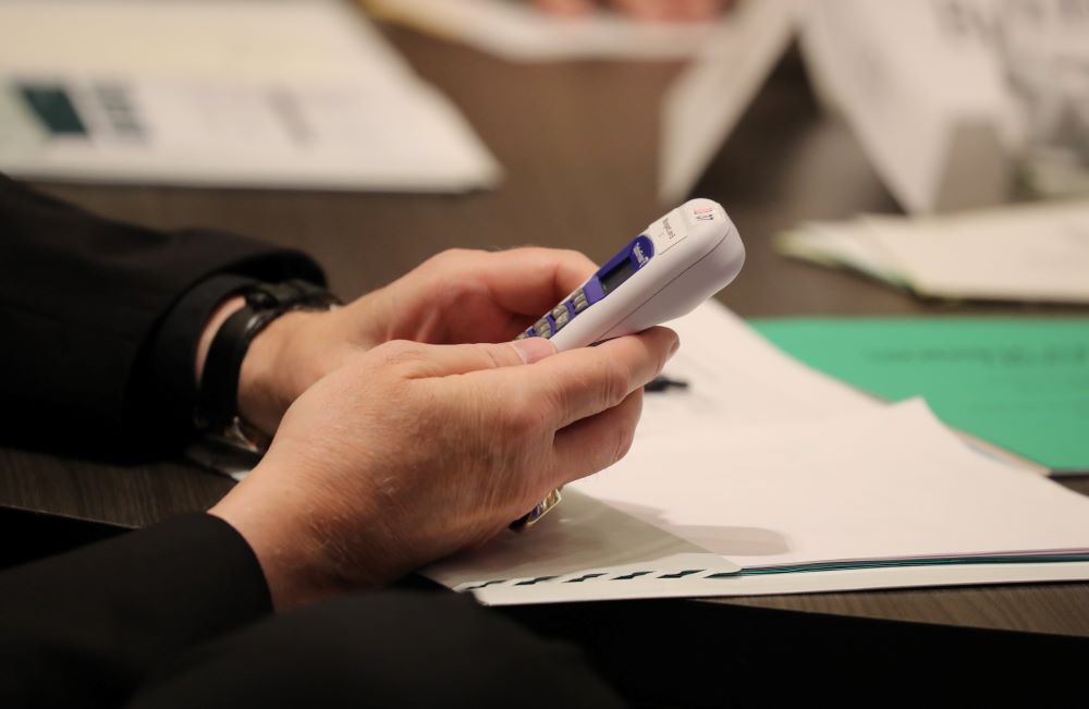 A bishop votes June 14 at the U.S. Conference of Catholic Bishops' Spring Plenary Assembly in Louisville, Ky.