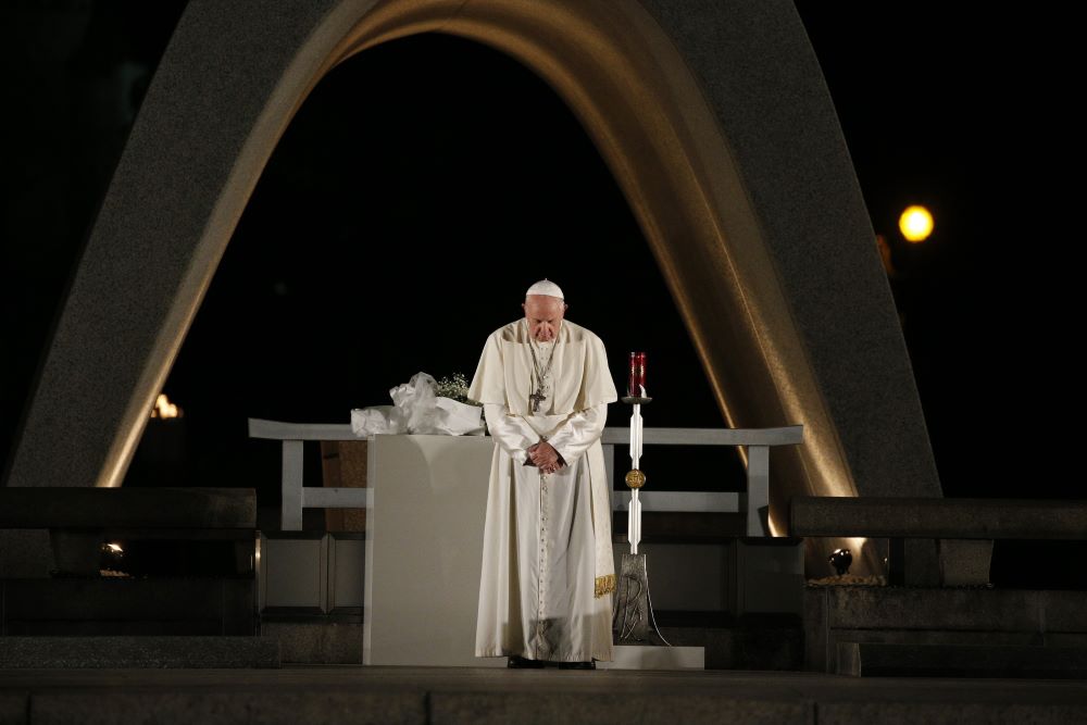 Pope Francis participates in a moment of silence during a meeting for peace at the Hiroshima Peace Memorial in Hiroshima, Japan, Nov. 24, 2019. 