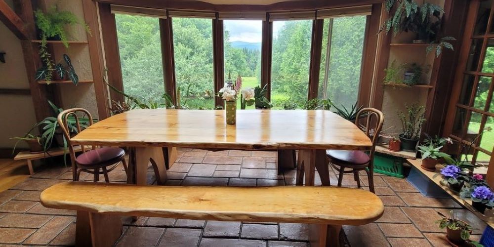 The dining table  overlooks the grounds of the Green Mountain Monastery.