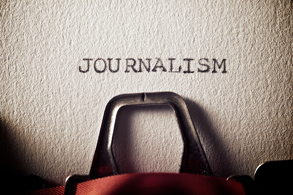 Closeup of the word "JOURNALISM" typed on a typewriter (Dreamstime/Pedro2009)