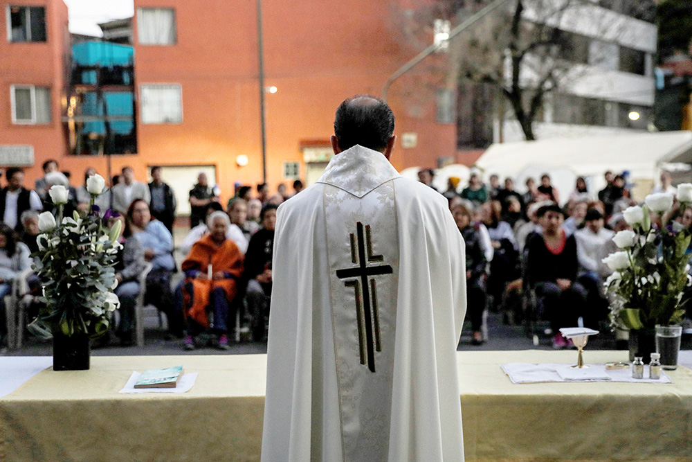 A priest celebrates Mass in Mexico City Jan. 11, 2018. (OSV News/Reuters/Carlos Jasso) 