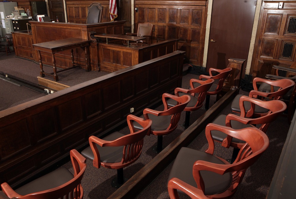 Chairs and stands in empty courtoom.