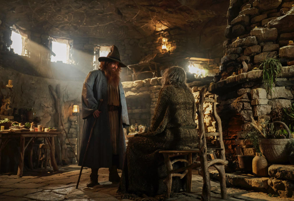 In the Season Two finale of "The Lord of the Rings: The Rings of Power" the identity of the mysterious "Stranger" is revealed. Rory Kinnear is pictured here as Tom Bombadil, left, and Daniel Weyman as the Stranger. (Prime Video/Ross Ferguson)