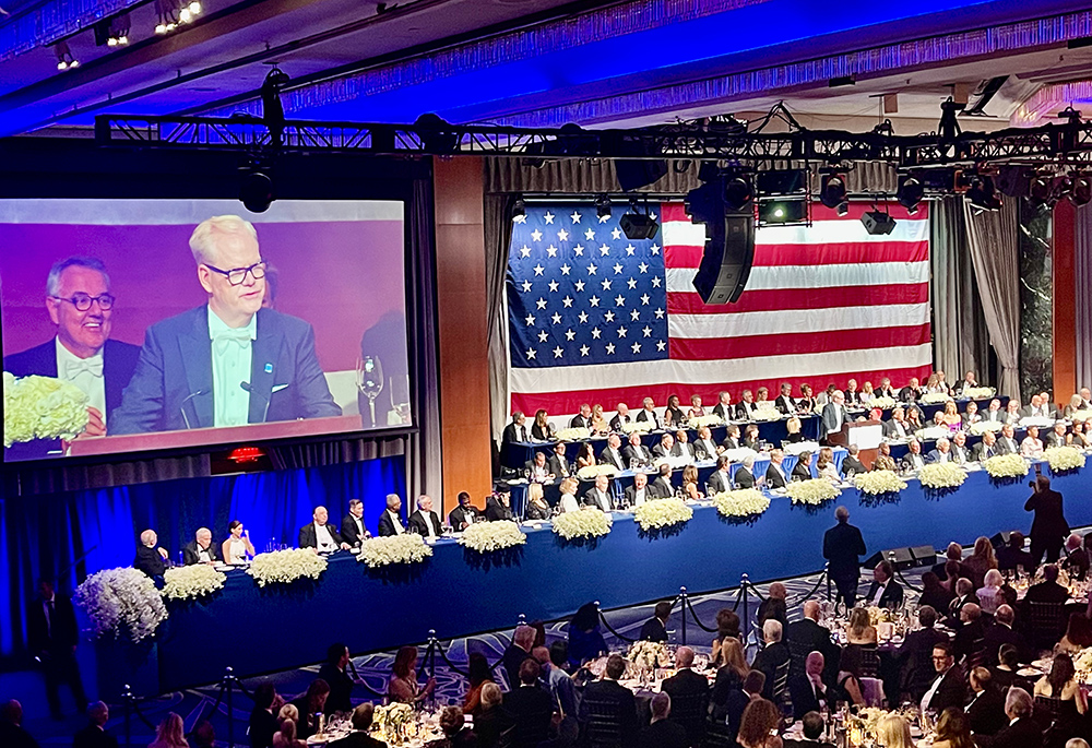 Comedian Jim Gaffigan, master of ceremonies at the Alfred E. Smith Memorial Foundation Dinner Oct. 17, addresses the crowd at the fundraiser for Catholic charities in New York at the New York Hilton Midtown. (NCR photo/Camilllo Barone) 