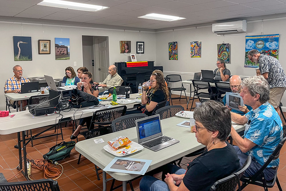 Members of Georgia Interfaith Power and Light take part in a text banking session in October in Savannah. (Courtesy of Georgia Interfaith Power and Light)