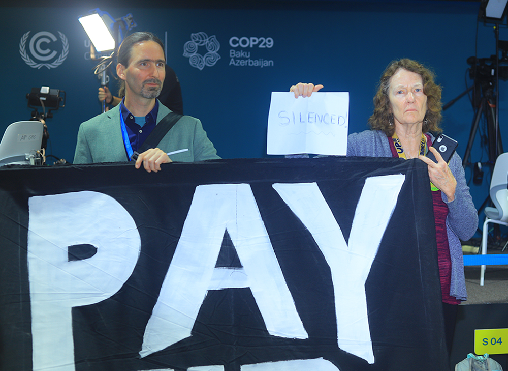 Lisa Sullivan, an Integral Ecology senior program officer for the Maryknoll Office for Global Concerns is pictured during the demonstrations at COP29 in Baku, Azerbaijan, on Nov. 11-22. (NCR photo/Doreen Ajiambo)