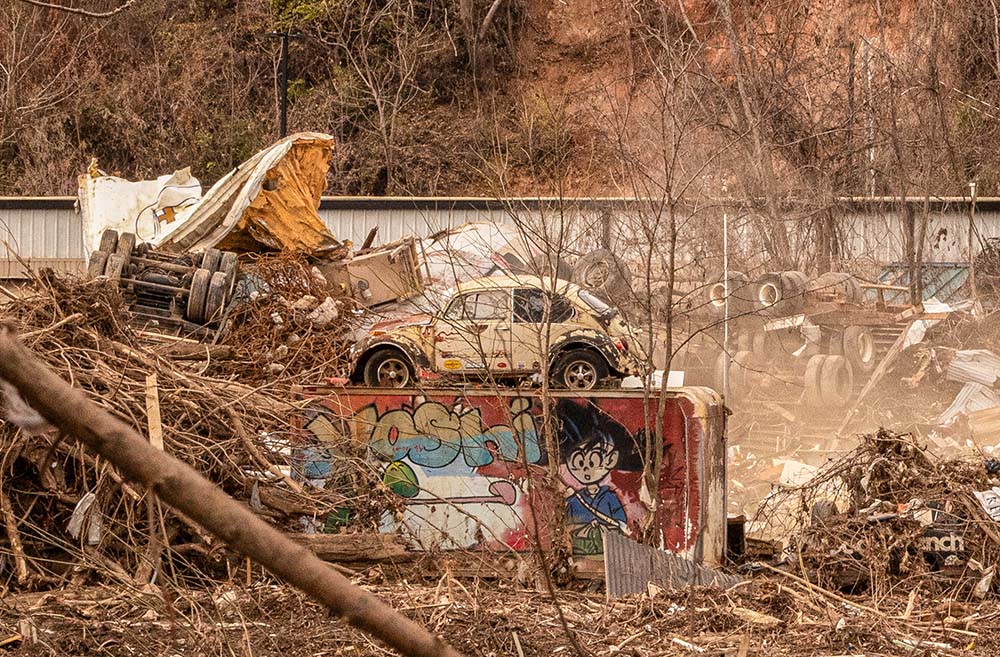 Volkswagen and art, on banks of Swannanoa River, near Biltmore Village, Dec. 13, 2024 (Darlene O'Dell)