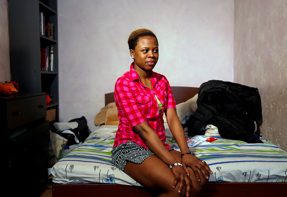 Blessing Obuson, 19, from Nigeria, rescued from human traffickers, poses for a portrait in a shelter on the outskirts of Moscow in this Feb. 21, 2019, file photo. The Congregation of the Handmaids of the Holy Child Jesus is among those leading grassroots interventions in Nigeria. (CNS/Reuters/Maxim Shemetov)