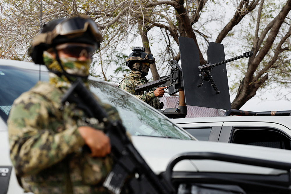 Members of the Mexican Navy guard the area where a temporary shelter is being built to receive Mexicans due to possible massive deportations from the U.S., in Matamoros, Mexico, Jan. 25, 2025. (Reuters/Daniel Becerril)