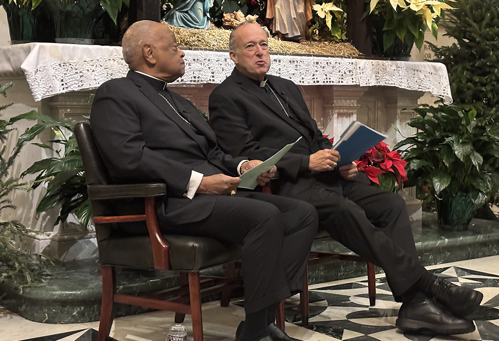 Cardinal Robert McElroy and Cardinal Wilton Gregory are seated at St. Matthew's Cathedral in Washington D.C.,prior to a Jan. 6 press conference announcing McElroy's appointment to the Washington Archdiocese. (NCR photo/James Grimaldi)