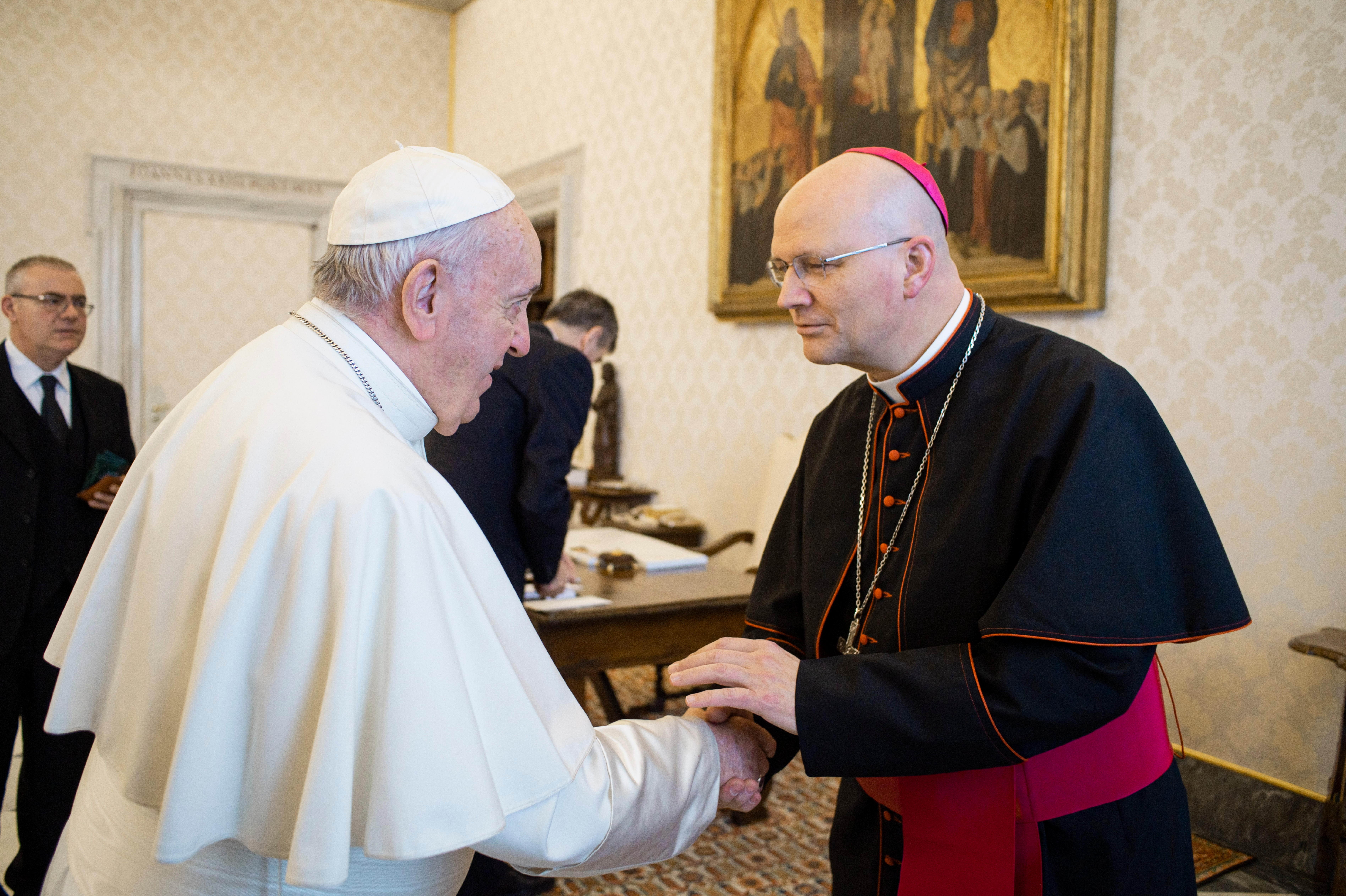 Pope Francis greets Bishop Edward J. Weisenburger of Tucson, Ariz., during a meeting with U.S. bishops at the Vatican Feb. 13, 2020. The bishops were making their "ad limina" visits to the Vatican to report on the status of their dioceses to the pope and Vatican officials. (CNS photo/Vatican Media)