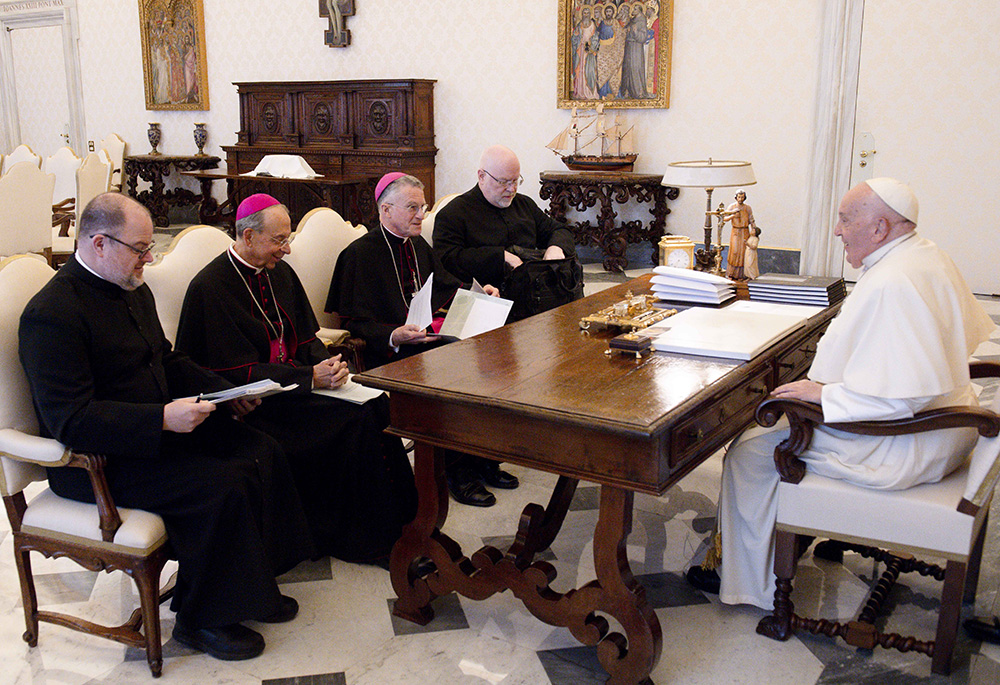 Pope Francis holds his spring meeting with the officers of the U.S. Conference of Catholic Bishops April 18, 2024, at the Vatican. Seated from left are: Fr. Michael J.K. Fuller, the conference's general secretary; Archbishop William Lori of Baltimore, vice president; Archbishop Timothy P. Broglio, president and head of the U.S. Archdiocese for the Military Services; and Fr. Paul B.R. Hartmann, associate general secretary. (CNS/Vatican Media)