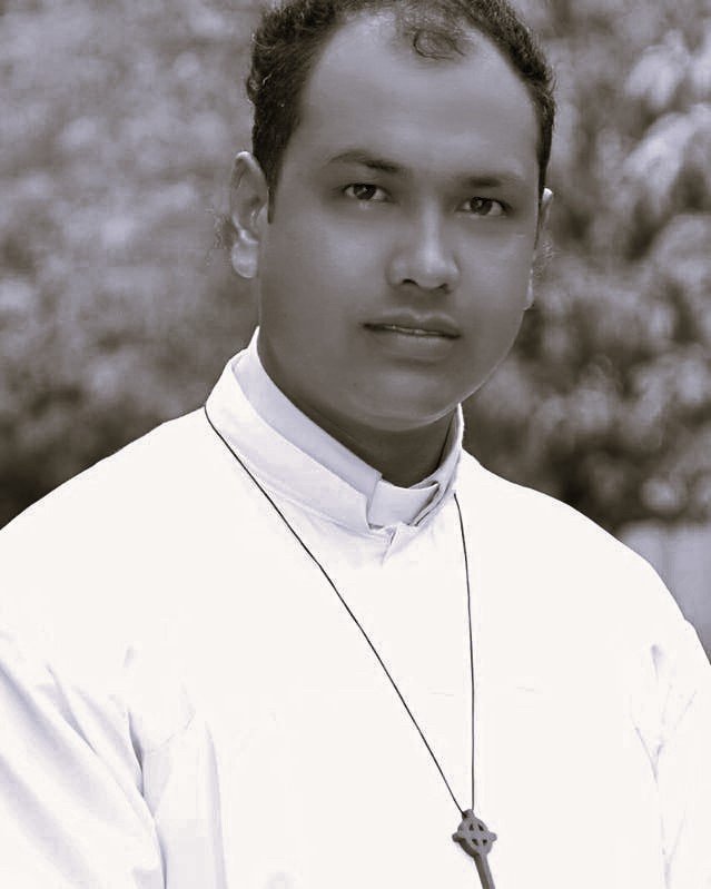 Black and white portrait of the priest.