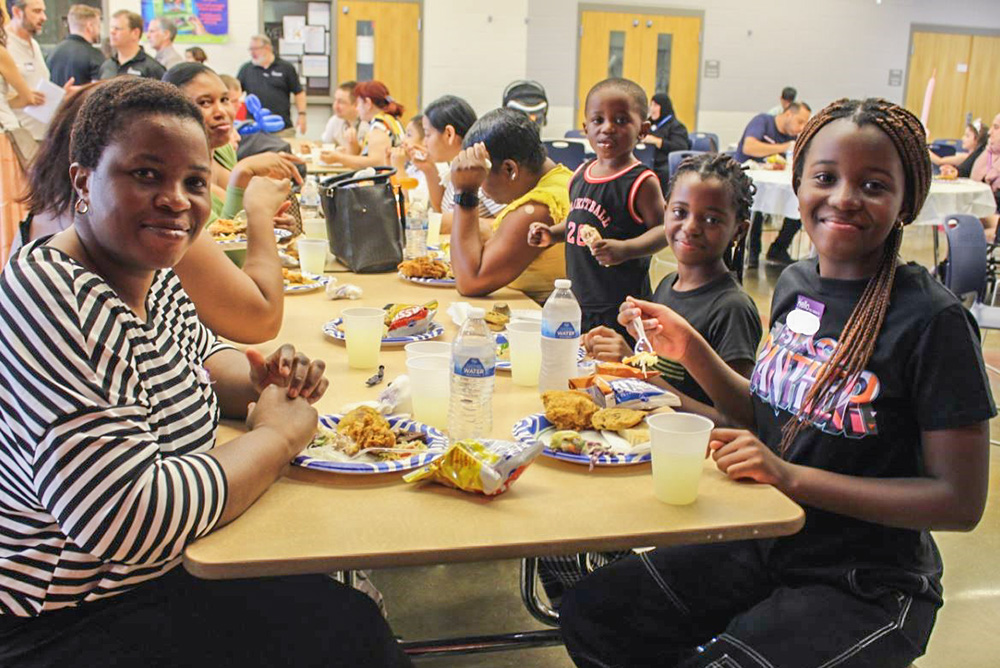 Cincinnati-based refugees celebrate Catholic Charities' World Refugee Day event at the Academy of Multilingual Immersion Studies in Cincinnati in June 2024. (Courtesy of Catholic Charities Southwestern Ohio/David Taylor)