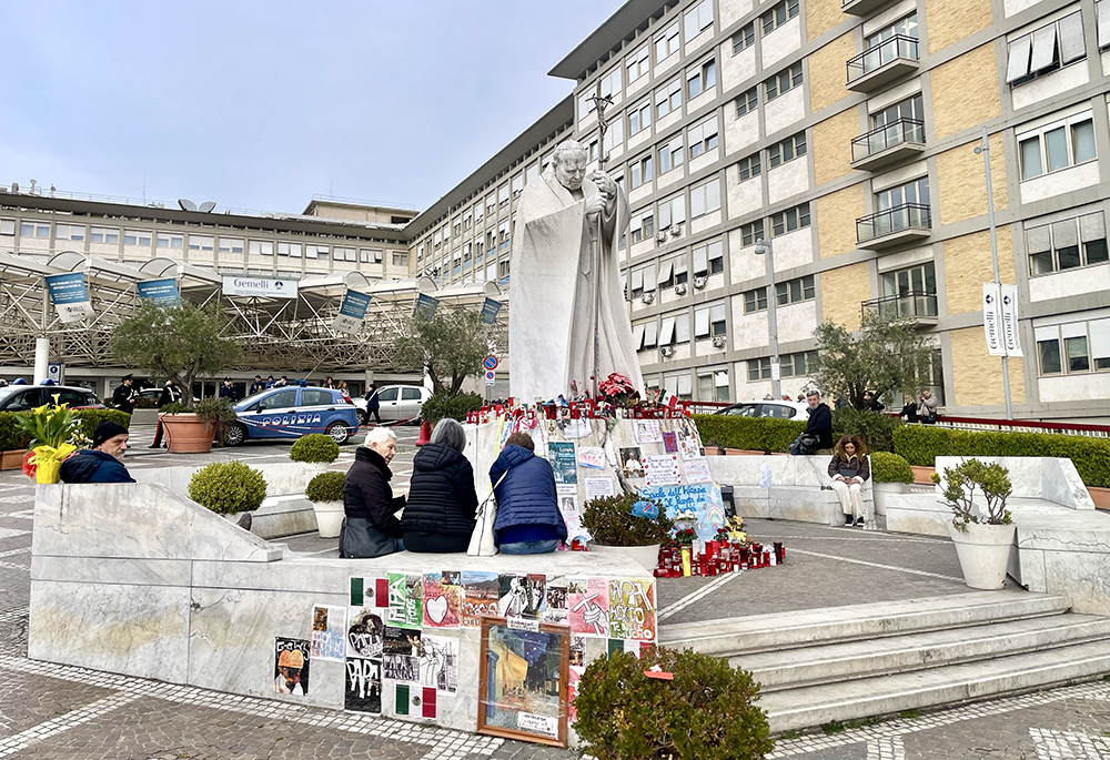 The St. John Paul II statue is pictured in the main courtyard at Gemelli Hospital in Rome. (NCR photo/Camillo Barone)