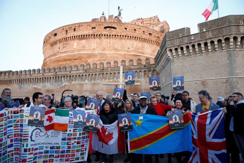 Clerical sex abuse survivors and their supporters rally outside Castel Sant'Angelo in Rome in this Feb. 21, 2019, file photo. The rally took place during a three-day meeting of 130 heads of bishops' conferences. 