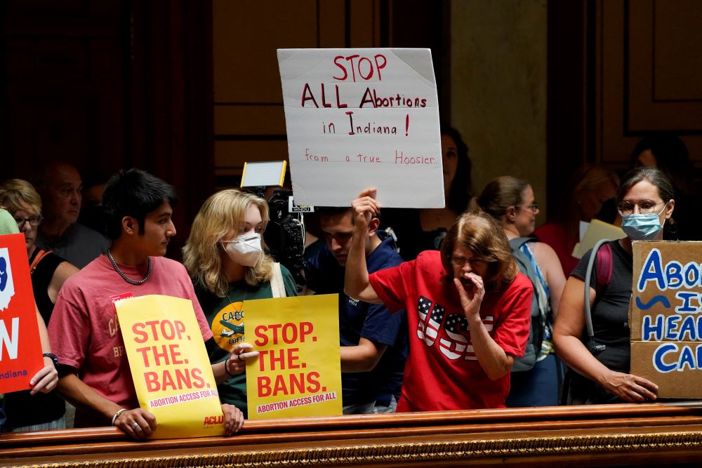 Activists protest inside the Indiana Statehouse in Indianapolis July 25 during a special session debate on banning abortion. (CNS/Reuters/Cheney Orr)