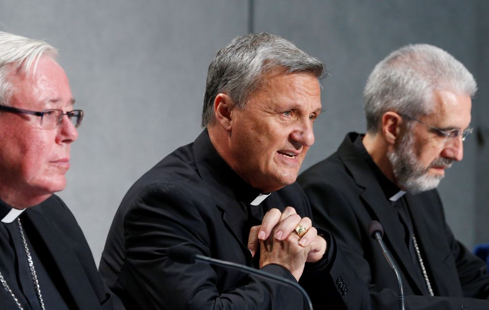 Cardinal Mario Grech, secretary-general of the Synod of Bishops, speaks during a news conference to present an update on the synod process at the Vatican Aug. 26.