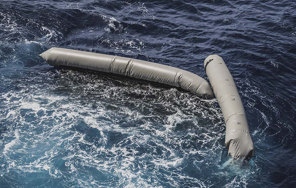 Debris from a dinghy that was supposedly carrying an estimated 130 migrants floats in the Mediterranean Sea northeast of the Libyan capital, Tripoli, April 22. (SOS Mediterranée via AP/Flavio Gasperini)