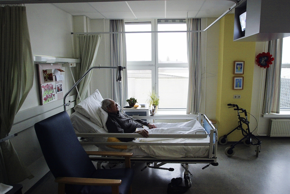 An unidentified man with Alzheimer's disease, who refused to eat, sleeps peacefully the day before passing away in a nursing home in Utrecht, Netherlands. (CNS/Reuters/Michael Kooren)