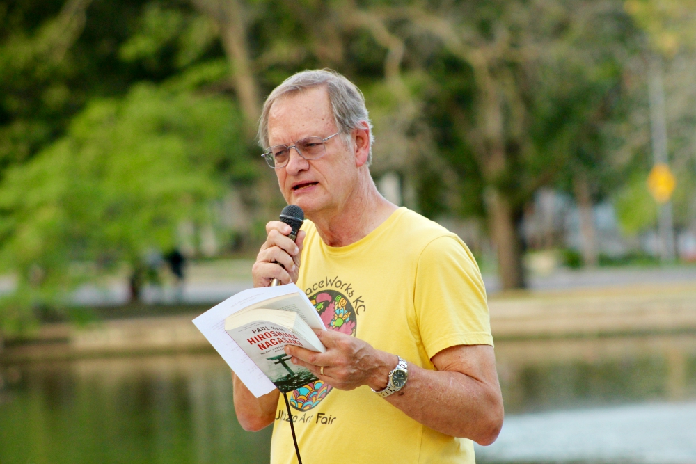 Dave Pack updates participants of the Hiroshima/Nagasaki Remembrance memorial Aug. 5 in Kansas City, Missouri, about efforts to ratify international Treaty on the Prohibition of Nuclear Weapons. (Jim Hannah)