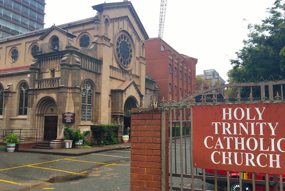 View of Romanesque style church with sign