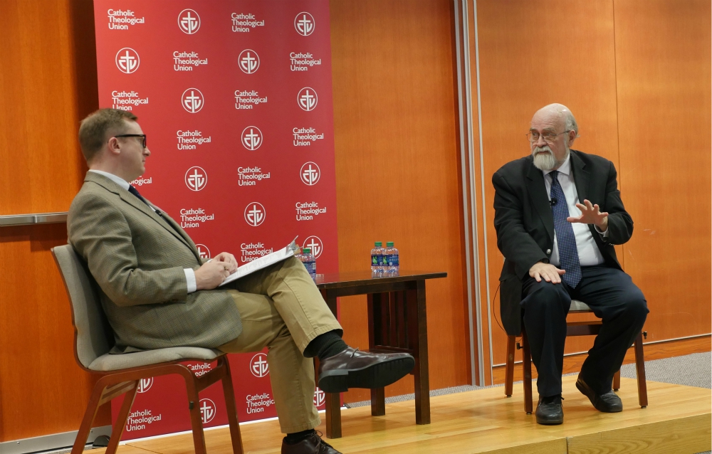 Steven Millies, left, and Precious Blood Fr. Robert Schreiter discuss "Peacebuilding at a Time of Political Polarization" in an event sponsored by the Bernardin Center at Catholic Theological Union in Chicago Dec. 1. (Catholic Theological Union)