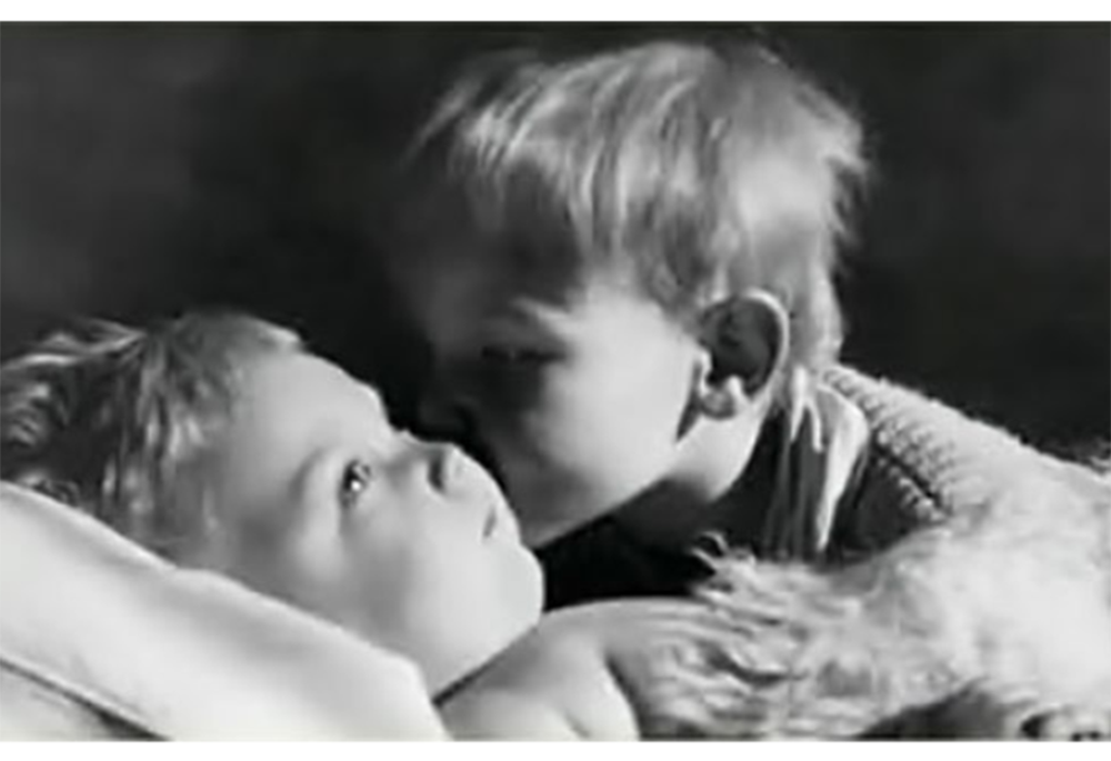 Oliver, the author's brother, is pictured with their brother Bruino in the family's Christmas card from 1948. (Courtesy of Christopher de Vinck)