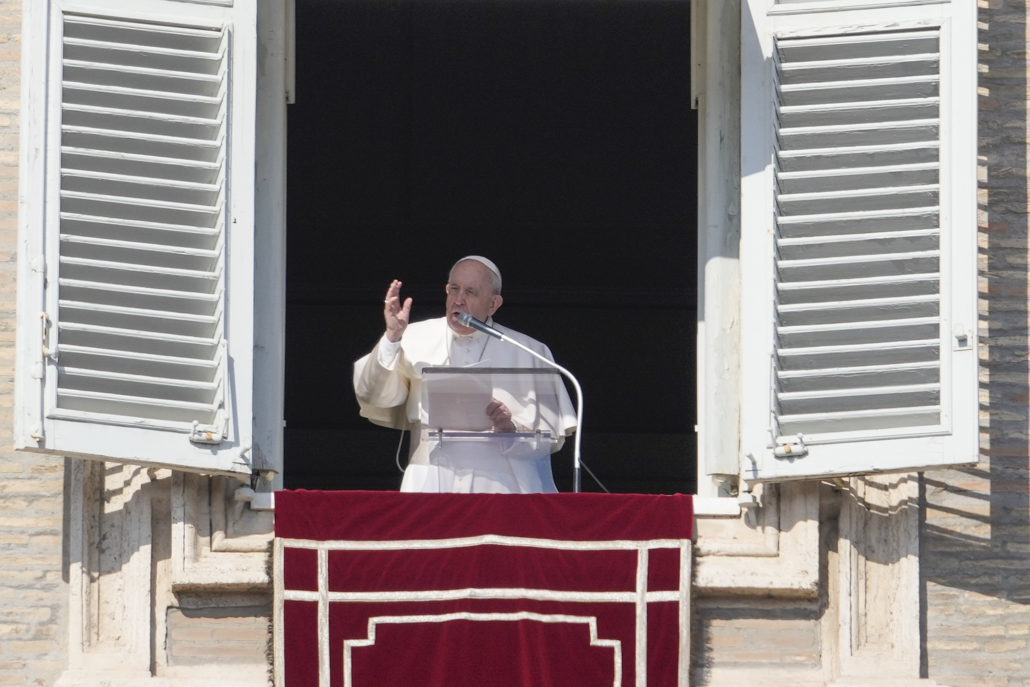 Pope Francis delivers the Angelus noon prayer from his studio window overlooking St. Peter's Square at the Vatican, Sunday, Feb. 6, 2022. (AP Photo/Gregorio Borgia)