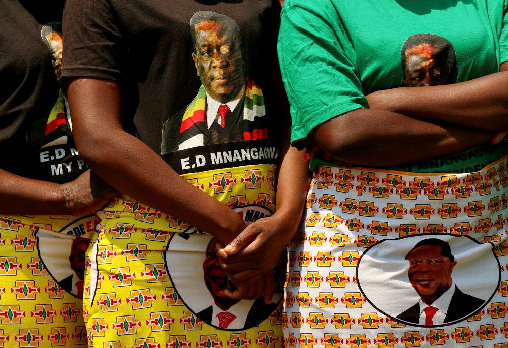 Supporters of Zimbabwe President Emmerson Mnangagwa are seen during the opening of a new Parliament building in Harare Oct. 1. (Newscom/Reuters/Philimon Bulawayo)