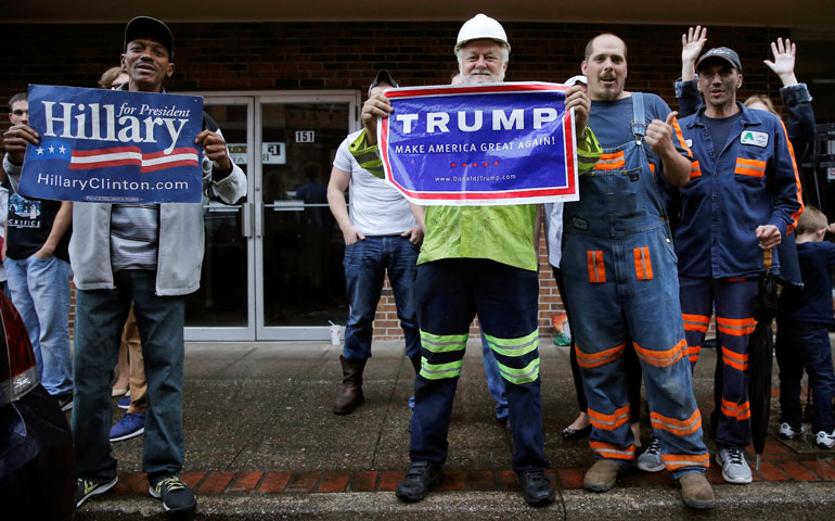 Supporters of Democratic presidential candidate Hillary Clinton and Republican presidential Donald Trump cheer outside a campaign event in Williamson, W.Va., May 2. (Reuters/Jim Young)