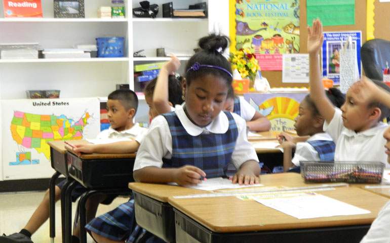 First-graders work on vocabulary at St. Francis International School Aug. 28. (Photos courtesy of St. Francis International School)