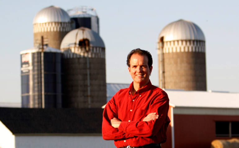 James F. Ennis, executive director of Catholic Rural Life, stands near a farm in Elko New Market, Minn., in this 2009 file photo. (CNS photo/Bob Roller) 