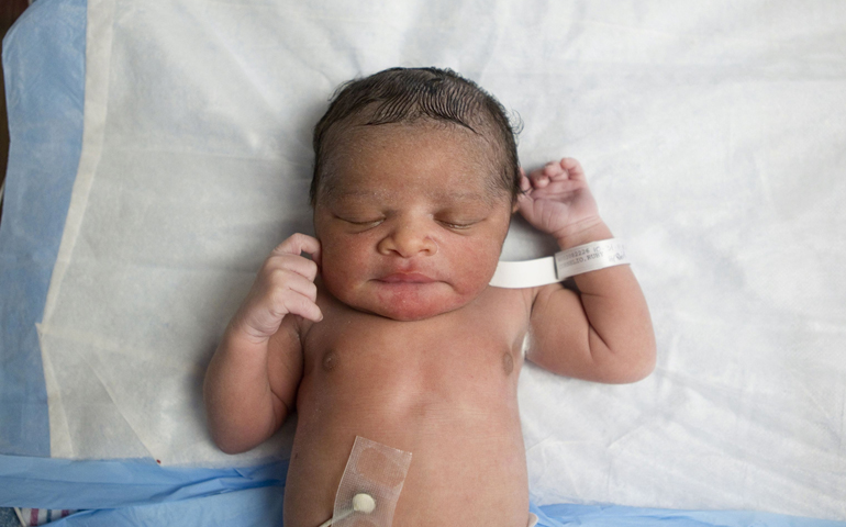 A newborn baby sleeps at Wyckoff Heights Medical Center in Brooklyn, N.Y., in this 2011 file photo. (CNS/Lucas Jackson, Reuters)