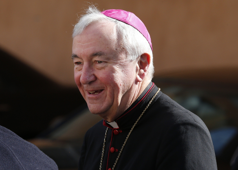 Cardinal Vincent Nichols of Westminster leaves a meeting of cardinals with Pope Francis in the synod hall at the Vatican in February. (CNS photo/Paul Haring)