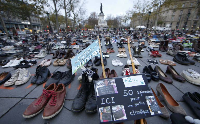 Pairs of shoes are symbolically placed on the Place de la Republique in Paris Nov. 29, ahead of the U.N. climate change conference, known as the COP21 summit, in Paris. (CNS photo/Eric Gaillard, Reuters)