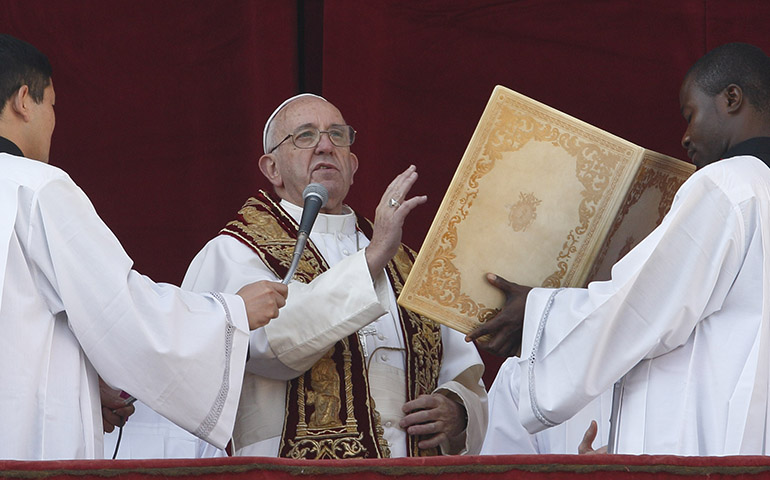 Pope Francis deliver his Christmas blessing "urbi et orbi" (to the city and the world) at the Vatican Dec. 25. (CNS/Paul Haring)