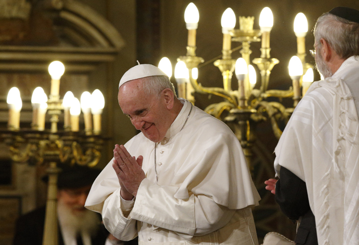 Pope Francis gestures as he visits the main synagogue in Rome Jan. 17. At right is Rabbi Riccardo Di Segni, the chief rabbi of Rome. (CNS/Paul Haring)