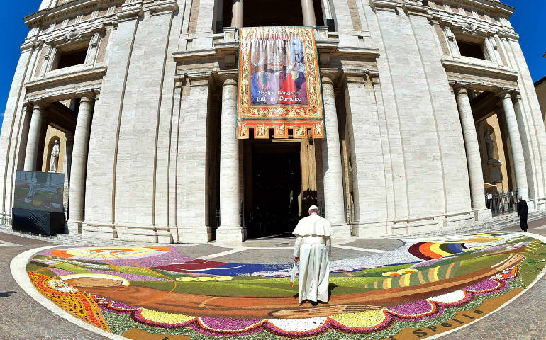 Pope Francis enters the Basilica of St. Mary of the Angels in Assisi, Italy, Aug. 4. (CNS photo/L'Osservatore Romano via Reuters)