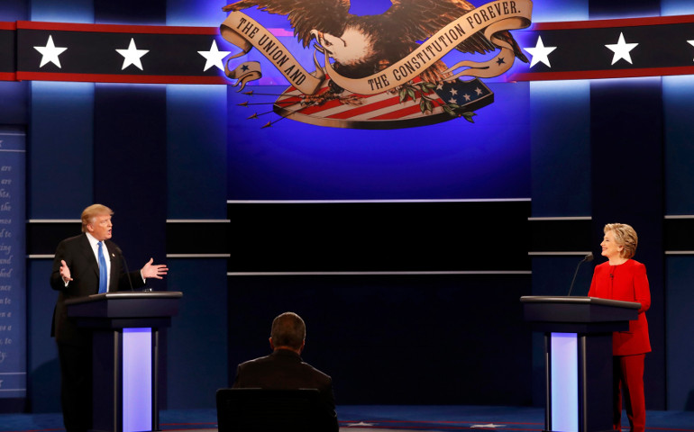 U.S. Republican presidential nominee Donald Trump speaks as Democratic presidential nominee Hillary Clinton listens during their first presidential debate Sept. 27 at Hofstra University in Hempstead, N.Y. (CNS/Reuters/Mike Segar)