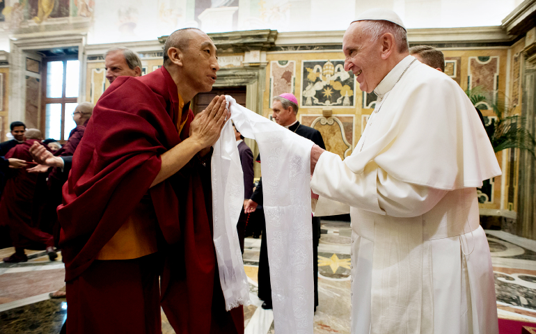 Pope Francis greets a Buddhist monk during a Nov. 3, 2016, audience with religious leaders at the Vatican. (CNS/L'Osservatore Romano)