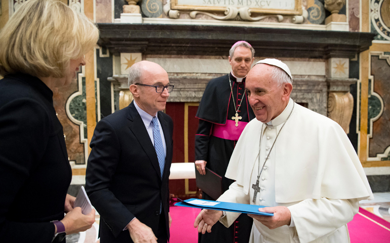 Pope Francis talks with Nancy Gibbs, editorial director of Time Inc. News Group, and Alan Murray, editor-in-chief of Fortune, at the Vatican Dec. 3. The business leaders were taking part in the Fortune-Time Global Forum in Rome. (CNS/L'Osservatore Romano)