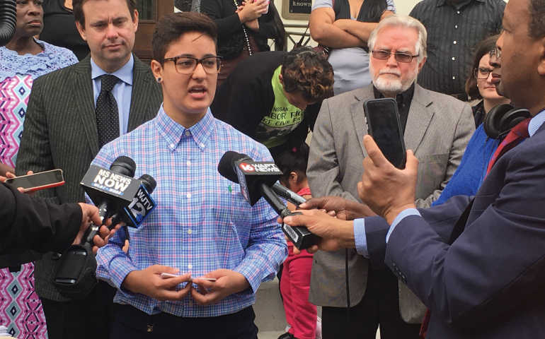 Daniela Vargas, an Argentine native who is a beneficiary of the Deferred Action for Childhood Arrivals program, or DACA, speaks at a March 1 news conference on the steps of the Jackson Police Department in Mississippi. (CNS photo/Tereza Ma, Mississippi Catholic)