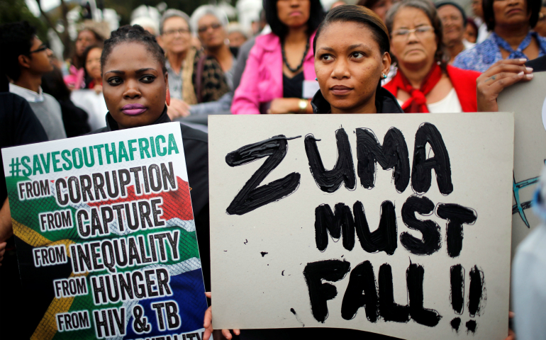 Demonstrators protest against South African President Jacob Zuma's firing of Finance Minister Pravin Gordhan outside Parliament March 31 in Cape Town. (CNS photo/Mike Hutchings, Reuters)